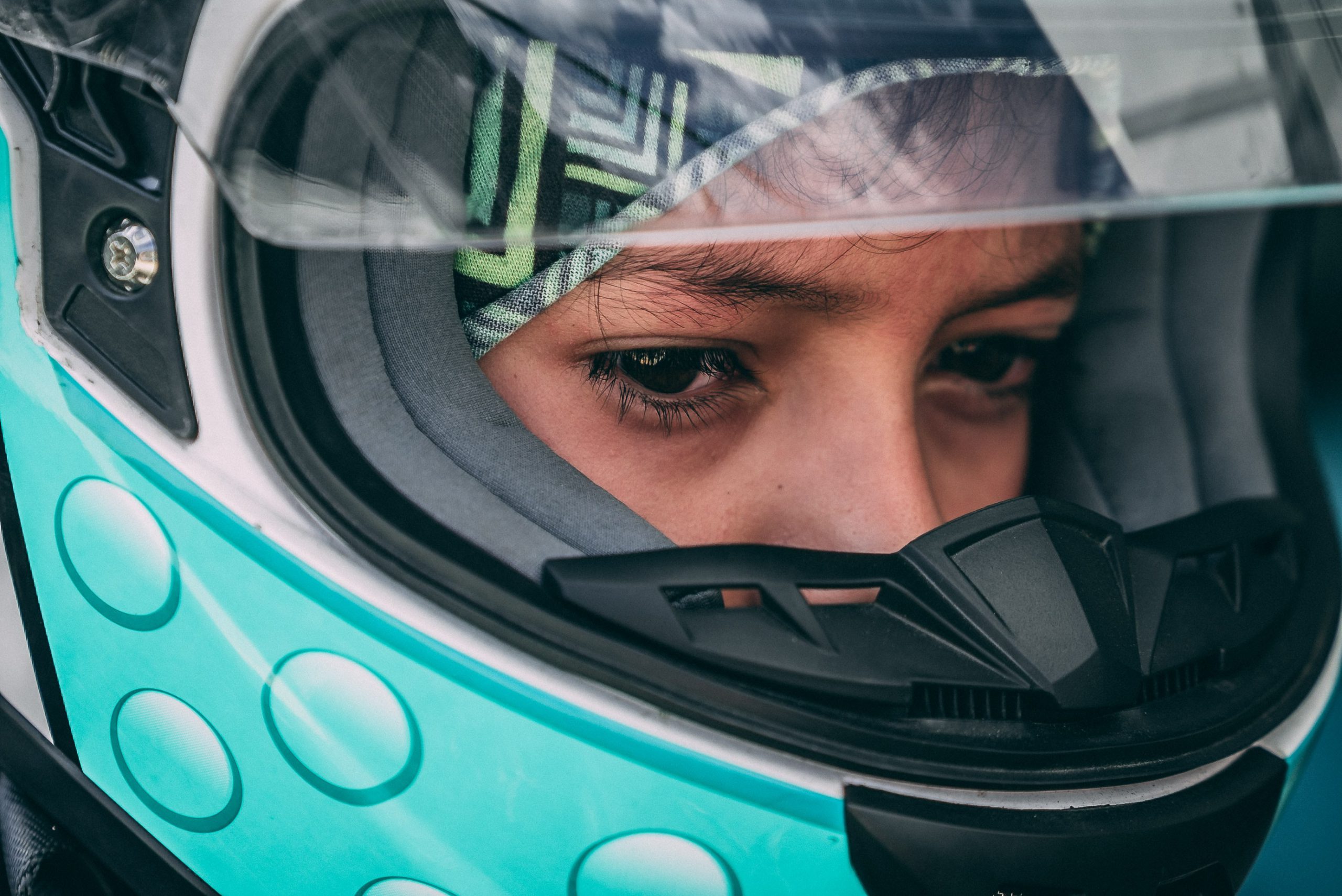 Woman driver in a Bell Racing Helmet