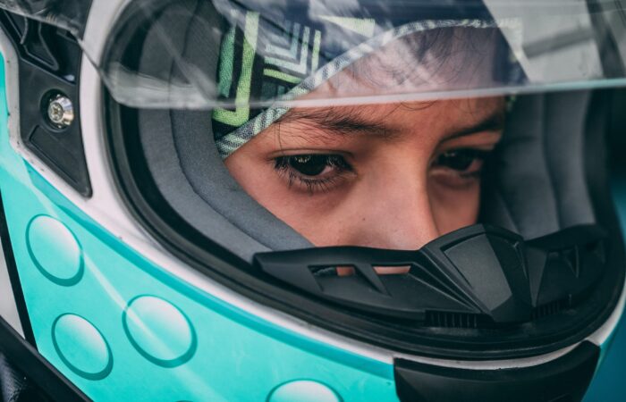 Woman driver in a Bell Racing Helmet